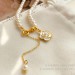 Vintage temperament elegant ins style camellia pearl necklace female personality senior sense small fragrant wind collarbone chain