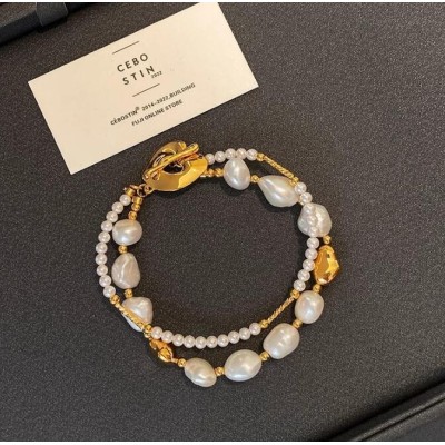 Baroque natural pearl double lotus leaf designer bracelet for women light luxury retro bracelet niche premium Hand sensation